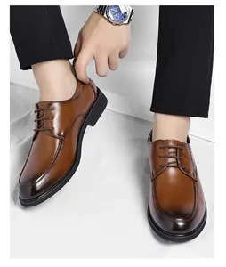 Professional close-up of men's brown leather formal shoes featuring a stylish lace-up design