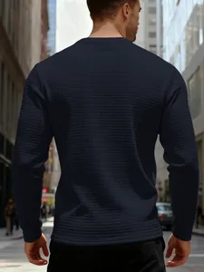 Back view of a men's navy blue sweatshirt with textured square jacquard pattern