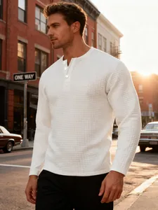 Macro detail showing white square jacquard texture on men's slim fit Henley long sleeve shirt