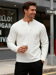 Detail showing the white waffle knit texture and henley collar on a male model