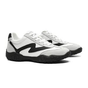 Black and white 7cm height increasing German training sneakers with racing style design
