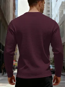 Detailed back view of men's burgundy sweatshirt with vintage waffle knit texture