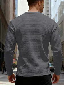 Back view showing detailed waffle knit texture of grey long-sleeve sweatshirt
