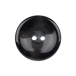High-end glossy black resin two-hole button with subtle marble texture for clothing