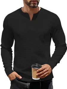 Detailed close-up of the black men's Henley shirt featuring jacquard waffle texture.