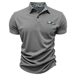 Detail view of grey men's slim fit polo shirt with patterned trim and quick-dry fabric.