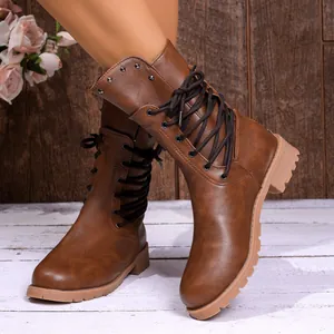 Classic vintage brown lace-up boots for women with studded detail and side zipper
