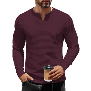 Men's slim fit burgundy waffle knit long sleeve Henley shirt with button-down neckline