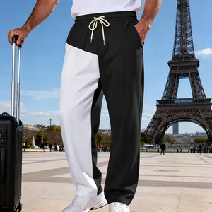 Dettaglio ravvicinato dei pantaloni uomo bicolore stile high street con coulisse in vita