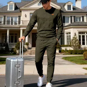 Premium men's olive green jacquard knit tracksuit set with luxury mansion background