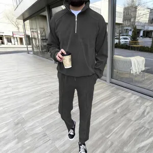 Urban casual men's two-piece tracksuit with half-zip stand collar and matching pants