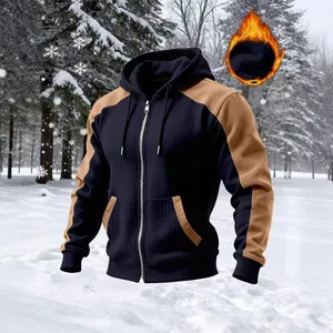 Detail of men's color-blocked hooded jacket with fleece lining for winter warmth.