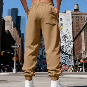 Detailed back view of khaki men's heavyweight fleece joggers with side stripes