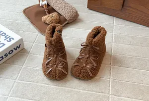 Stivaletti invernali in sherpa marrone per bambine con tre eleganti fiocchi decorativi