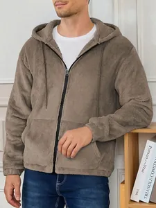Close-up shot of men's brown plush hooded fleece jacket with front zipper detail