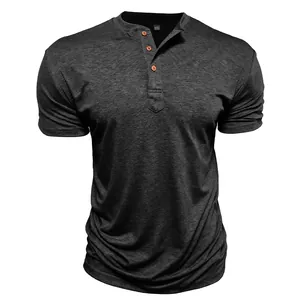 Macro view of dark gray men's Henley shirt showing fabric texture and wooden buttons