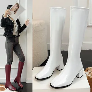 Elegant white and burgundy square-toe knight boots with chunky mid-heels for women.