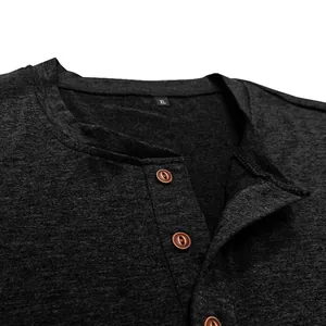 Close-up of men's charcoal grey Henley t-shirt showing collar and button detail