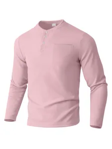Men's pink long-sleeved Henley shirt featuring waffle knit texture and chest pocket