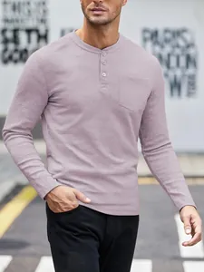 Detailed view of a lavender waffle knit long-sleeved Henley shirt with buttoned chest pocket