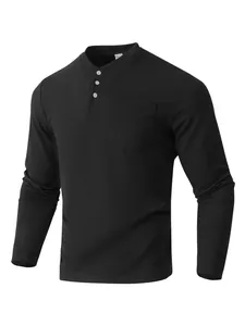 Macro detail of men's black waffle knit Henley shirt featuring buttons and chest pocket