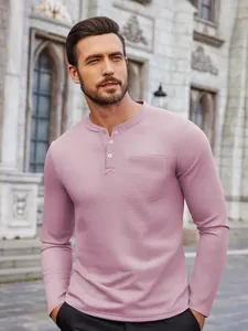 Detailed view of men's mauve waffle knit long sleeve Henley shirt with buttoned pocket