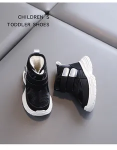 Detail view of black toddler winter snow boots with warm fleece lining and soft sole.