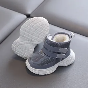 Grey toddler winter snow boots with thick fur lining and non-slip soft soles.