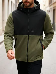 Detail view of a men's two-tone fleece hooded jacket in olive green and black color.