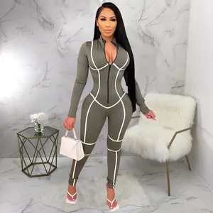 Combinaison moulante sexy à manches longues vert olive avec passepoil blanc contrasté et zip