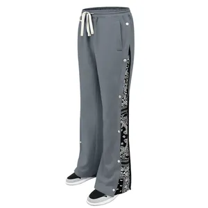 Men's gray sports pants with snap button side and paisley pattern detail
