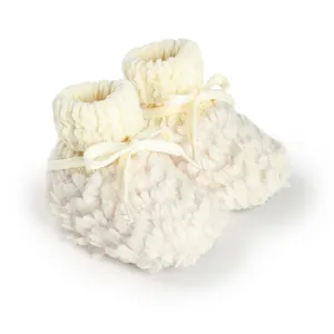 Scarpine invernali neonato in morbido peluche crema con polsini in maglia e fiocco
