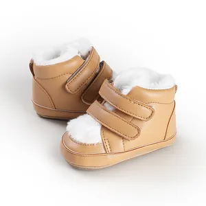 Cozy light brown baby winter boots with soft white faux fur lining and velcro