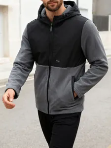 Detail of men's two-tone fleece hoodie jacket with black and grey panels and zipper.