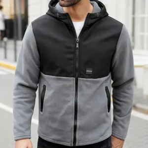 Close-up of men's hooded fleece jacket with grey and black color-blocking design