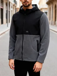 Detail shot of a men's color-block polar fleece hooded jacket with chest logo