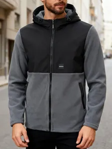 Close-up detail of a men's hooded two-tone fleece jacket with full zip closure