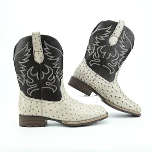 Vintage men's western cowboy boots with ostrich texture and flame embroidery details