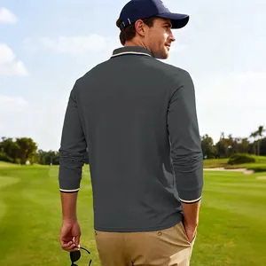 Vue de dos d'un polo de golf à manches longues gris pour homme sur un terrain vert