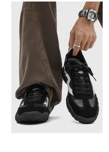 Detailed view of men's black and white German Army Trainers with 7cm height increase