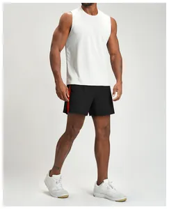 Man wearing black athletic shorts with red side stripe and white sleeveless shirt
