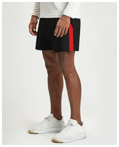 Side profile of men's quick-dry sports shorts with a stylish red vertical stripe.
