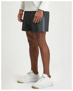 Side view detail of men's quick-dry breathable dark grey sports shorts for fitness