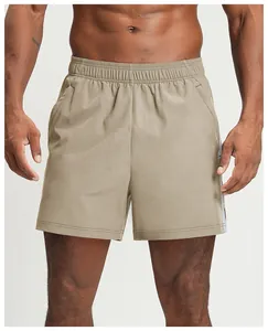 Detail view of khaki quick-dry men's sports shorts for fitness, hiking and trekking