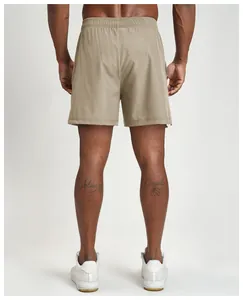 Back view of men's quick-dry khaki athletic shorts designed for fitness and hiking