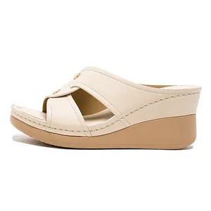 Comfortable beige platform wedge sandals for women with metal buckle detail