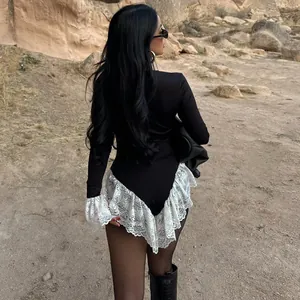 Detailed back view of a slim long-sleeved bodysuit with elegant white lace trim.