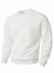 Vue détaillée de la texture matelassée blanche sur ce sweat-shirt à manches longues.