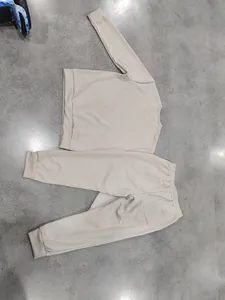 Men's beige textured long-sleeve sweatshirt and matching jogger pants lounge set