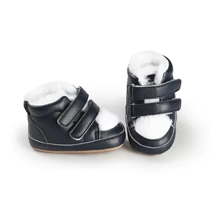 Navy blue baby walker shoes with white faux fur lining and double velcro straps detail